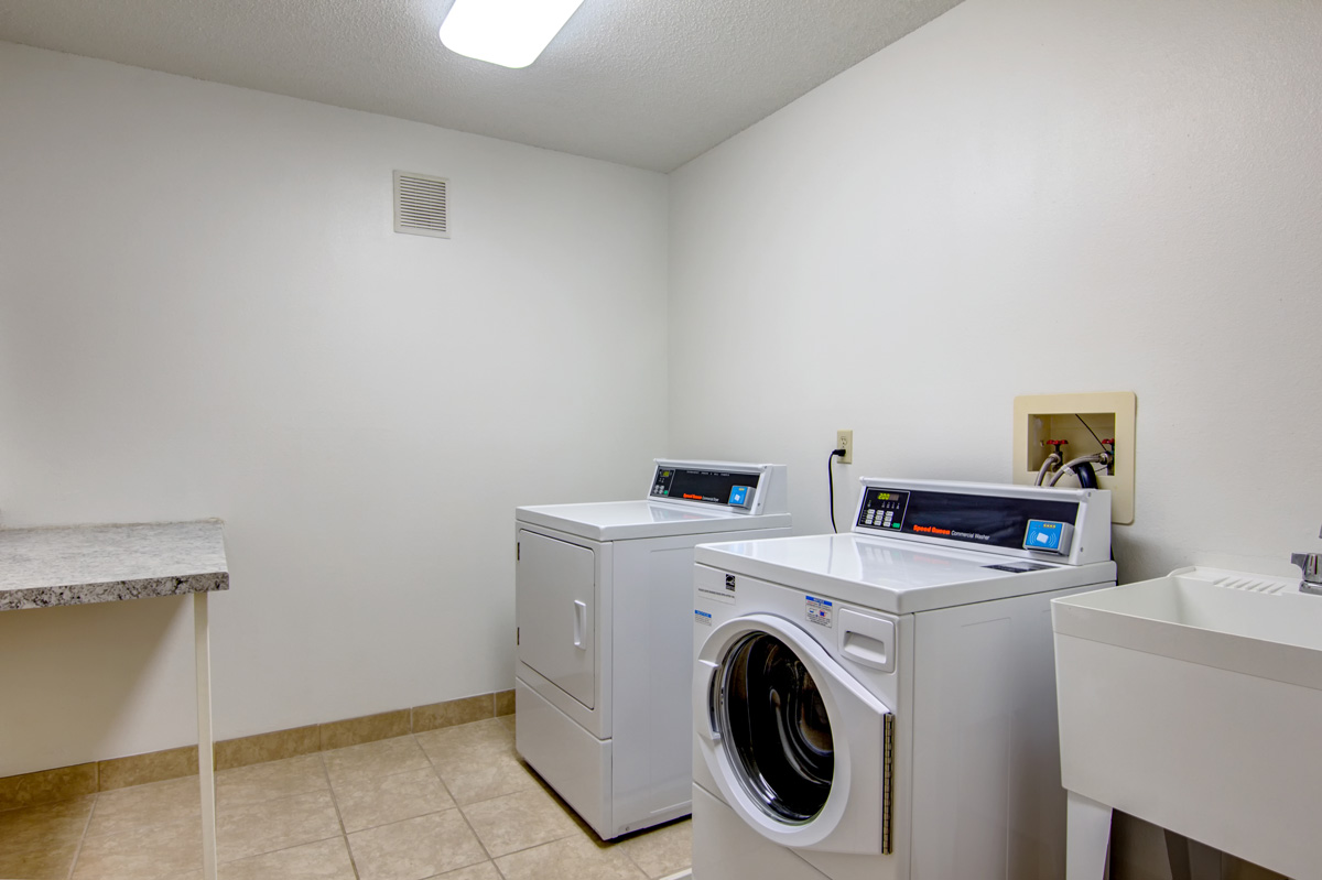 Laundry room with front loading washer and dryer